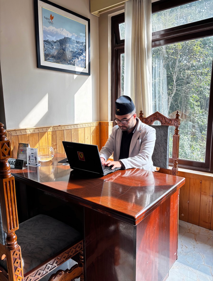 Kunden Resort at desk ready to help guests