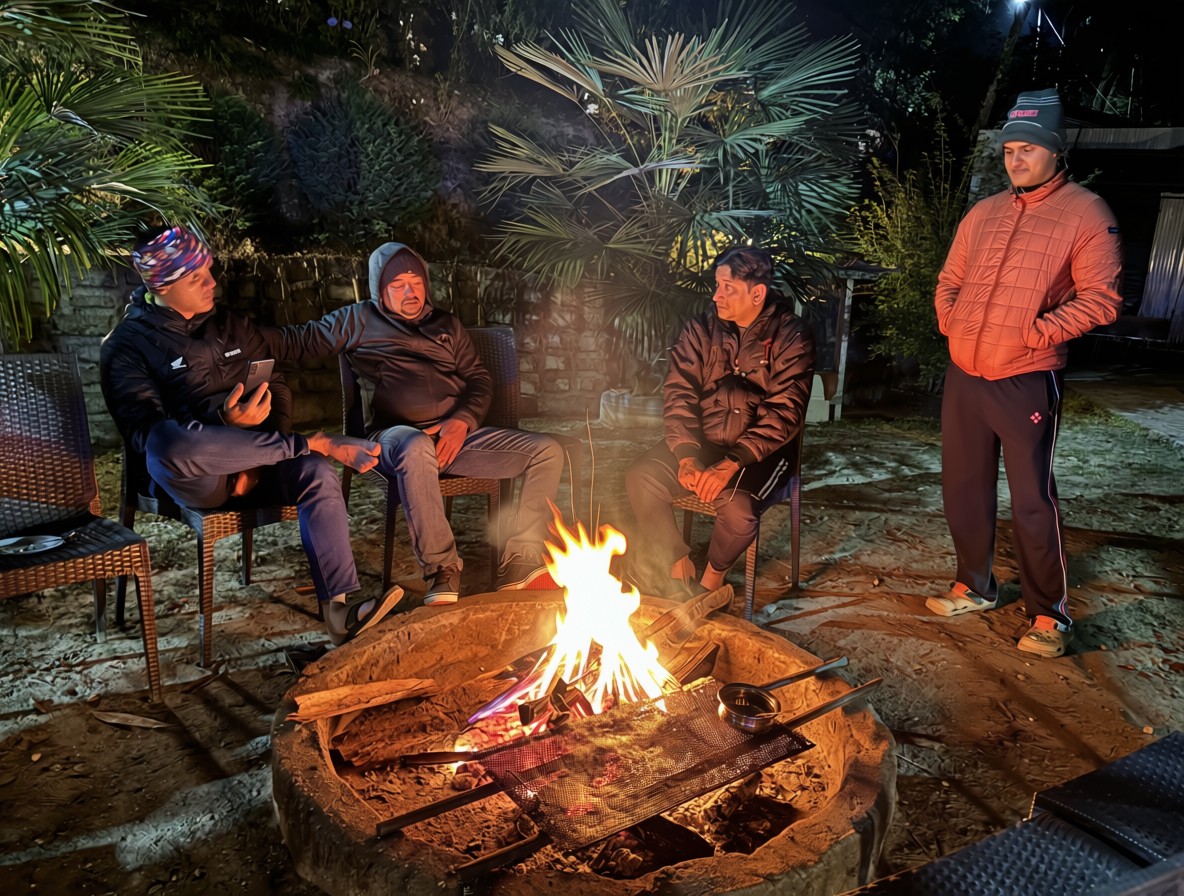 Guests enjoying a bonfire at Kunden Fortune Resort